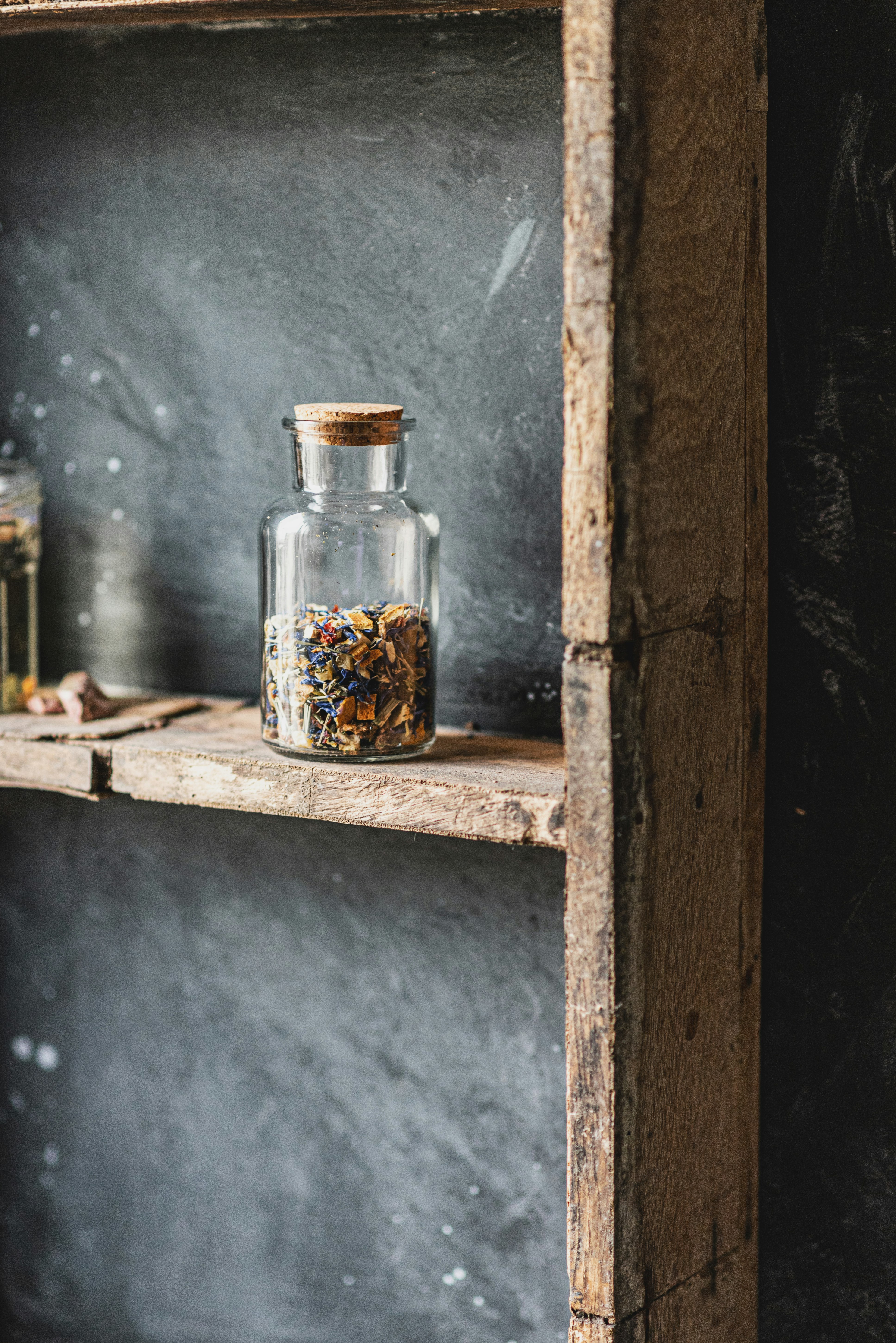 brown and black beans in clear glass jar